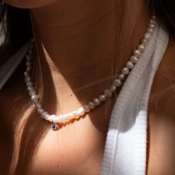 Collier perles avec pendentif mauvais œil
